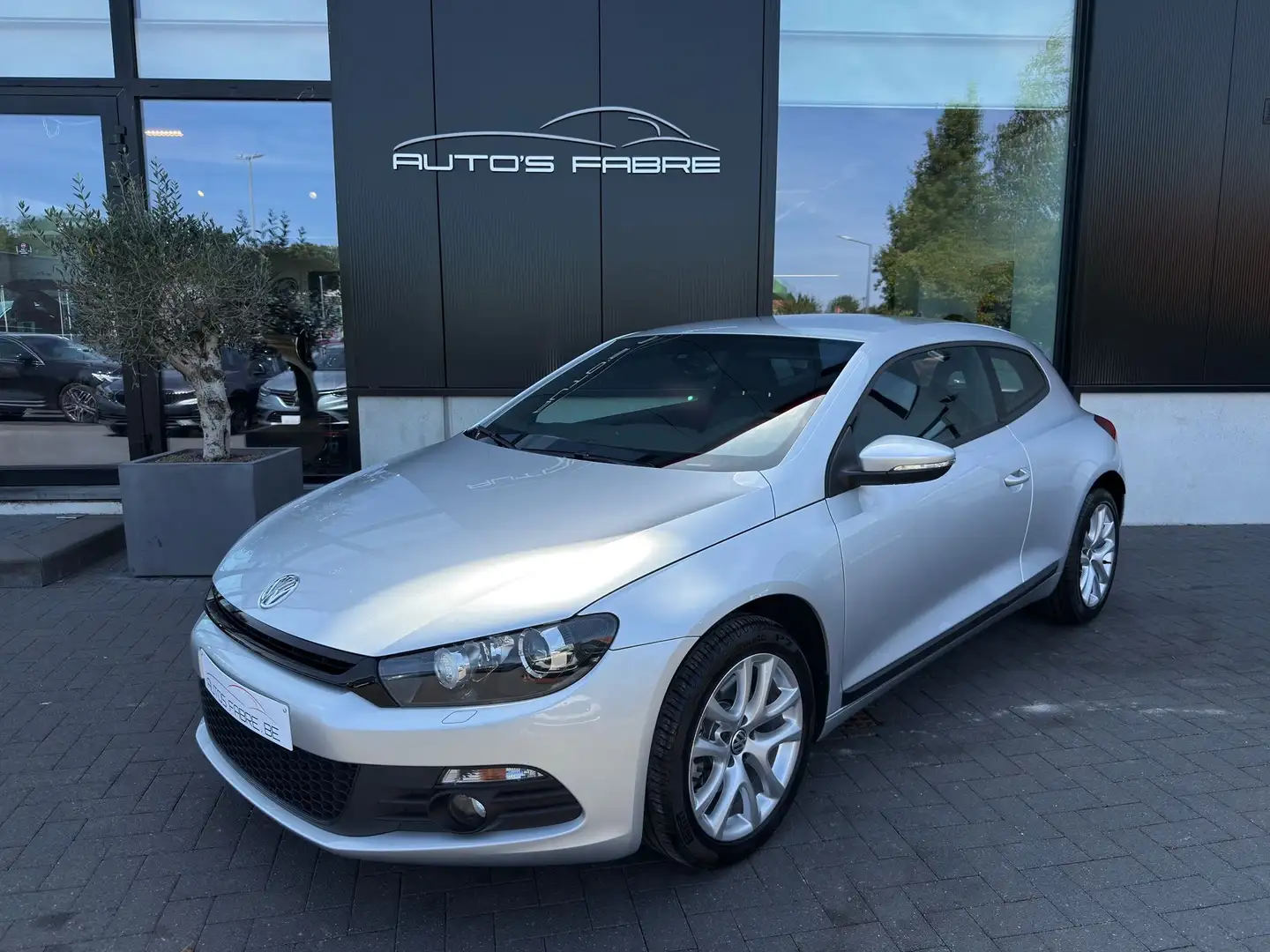 Volkswagen Scirocco 1.4 TSI DSG Leder 26000km GPS Nieuwstaat Zilver - 1