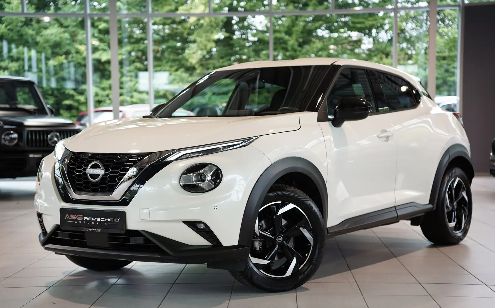 Nissan Juke Visia *2.H *Kamera *Navi *Klima *Tempomat Weiß - 1