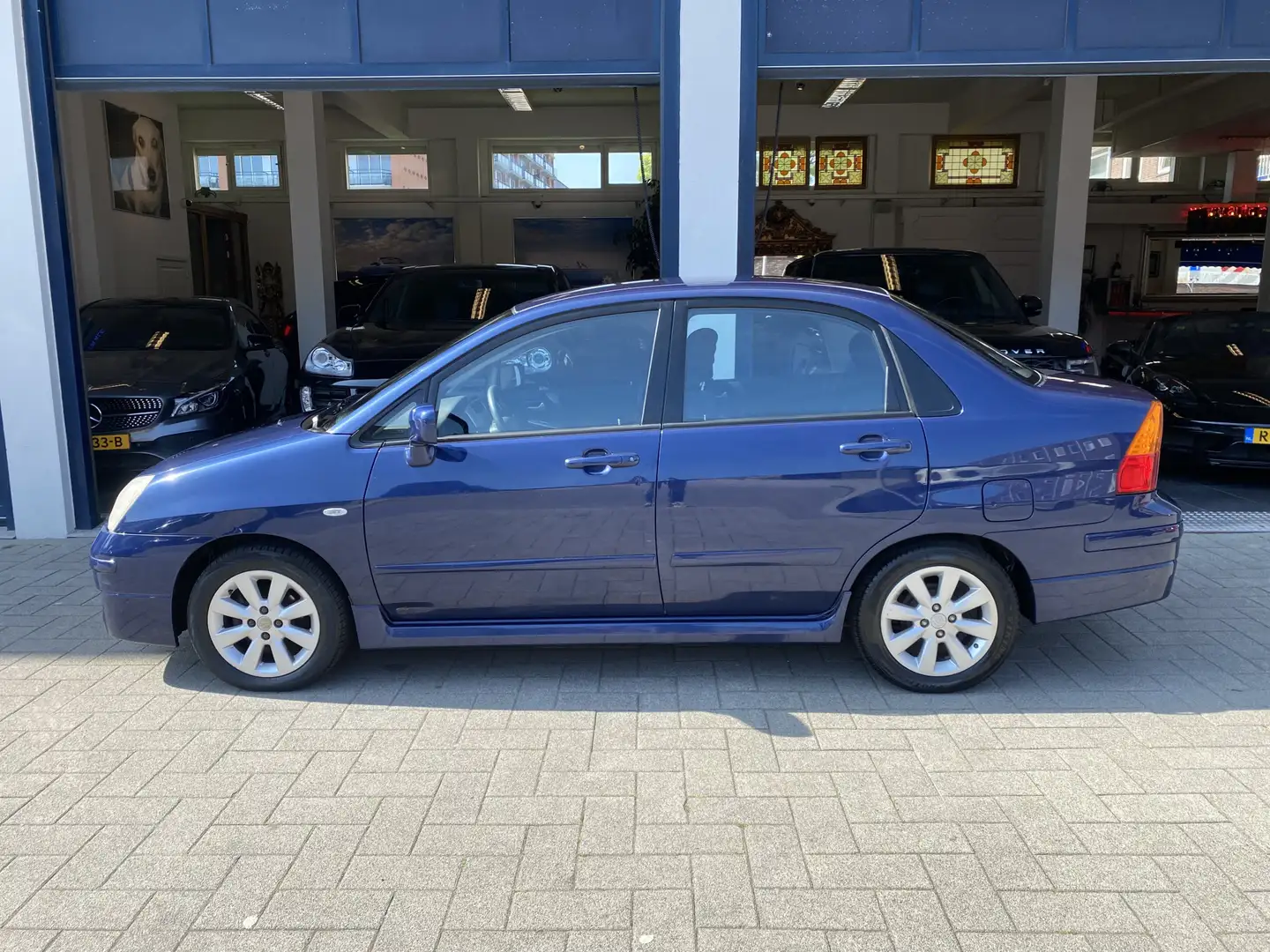 Suzuki Liana 1.6 Exclusive AUTOMAAT/NL AUTO/NAP/CLIMA Blue - 2