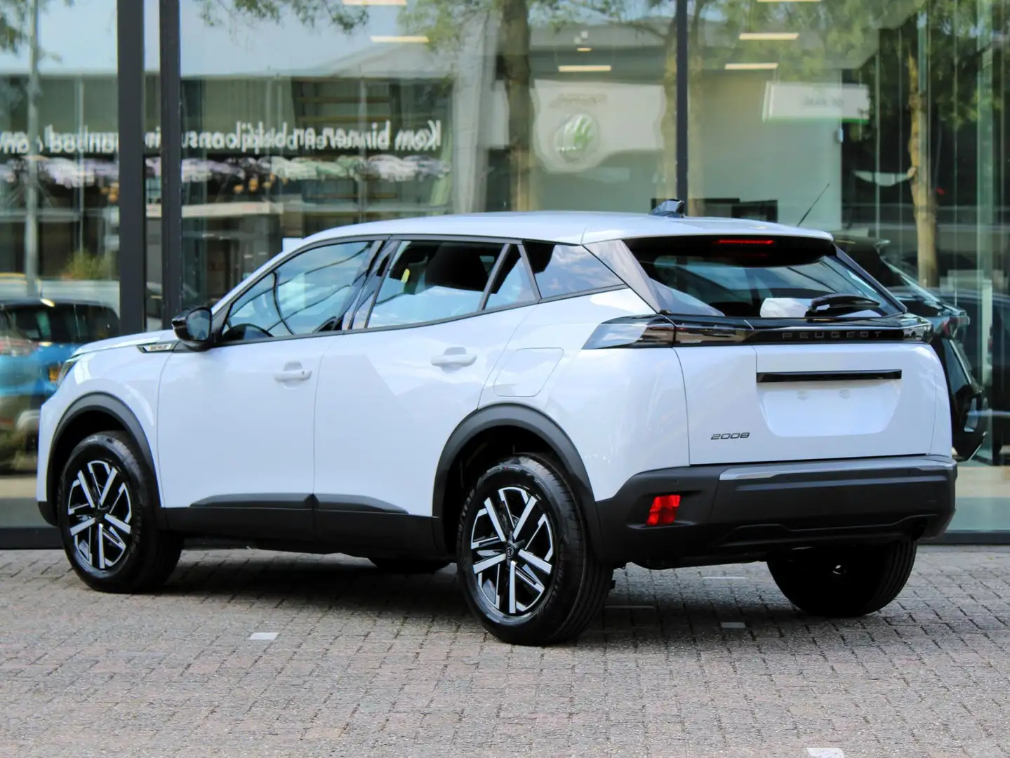 Peugeot 2008 1.2 PureTech 100 Style VOORRAAD KORTING Wit - 2
