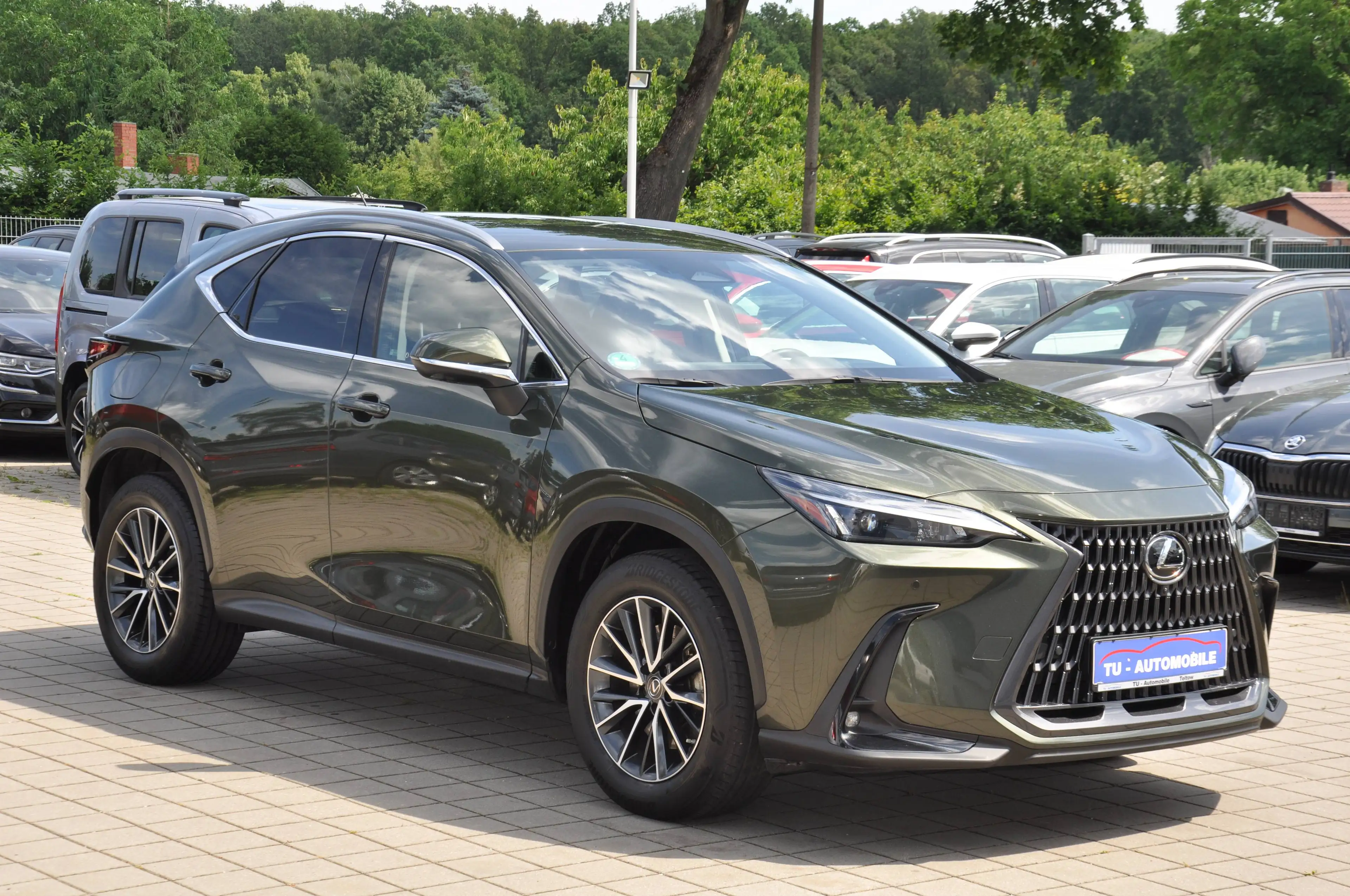 Lexus NX 450h+ 450 h E-Four NAVI-LEDER-360°-LED-ACC-8FACH-SITZKLIMA-SHZ HINTEN-LENKRADHZ-NAVI-ERSTE HAND-UNFALLFREI — photo 12
