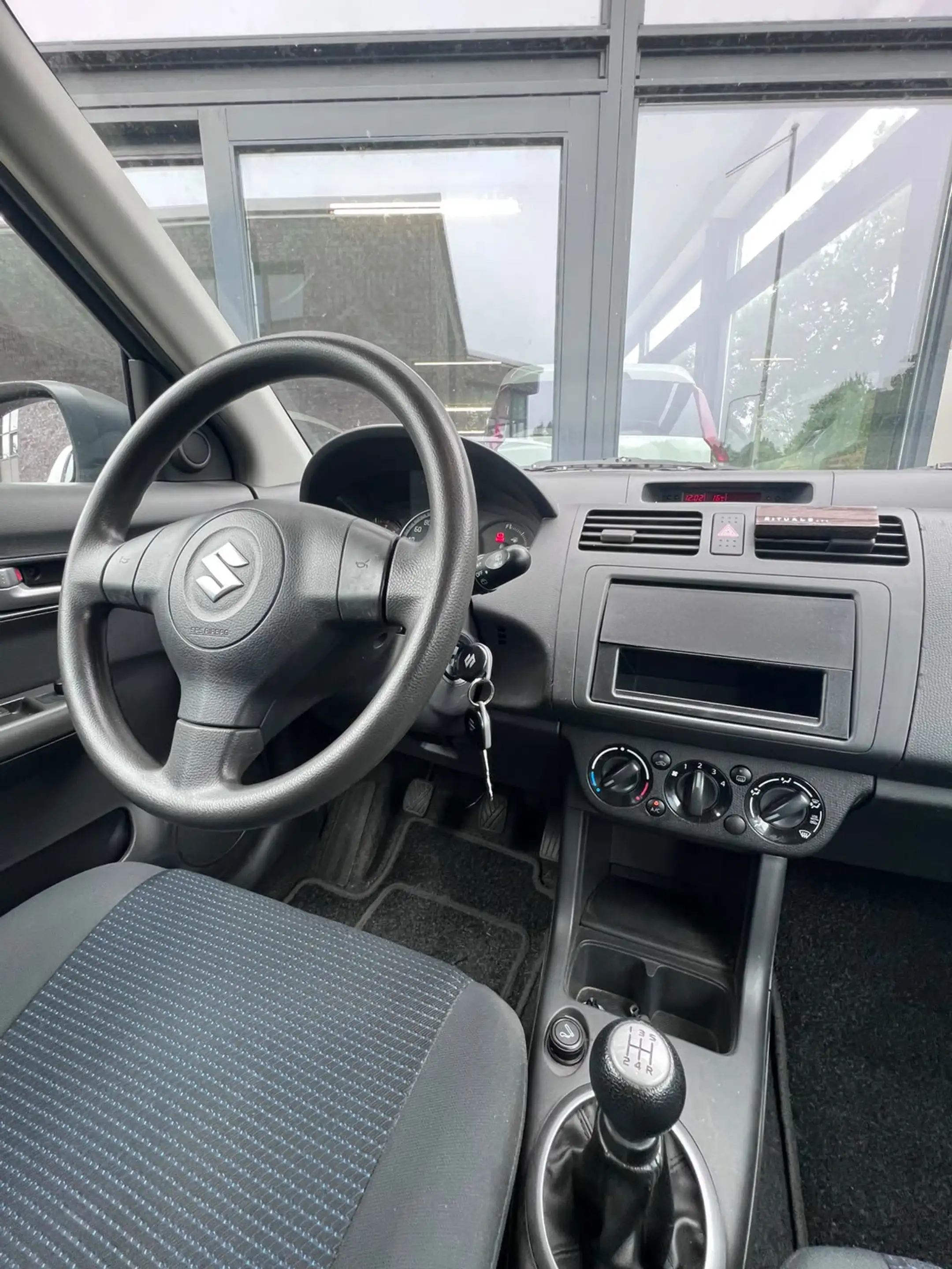 Suzuki Swift 1.3 Comfort | Bluetooth | LM velgen | Airco | Led — photo 12