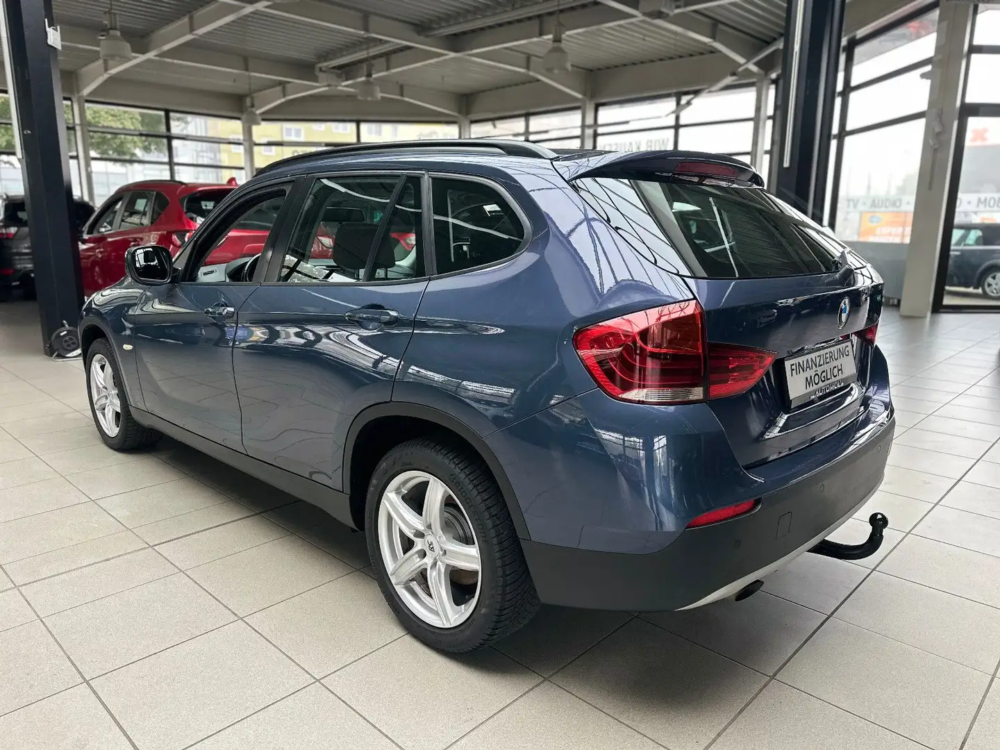 BMW X1 18 i sDrive Tuner*SHZ*AHK*PDC*Allwetter* Blau - 2