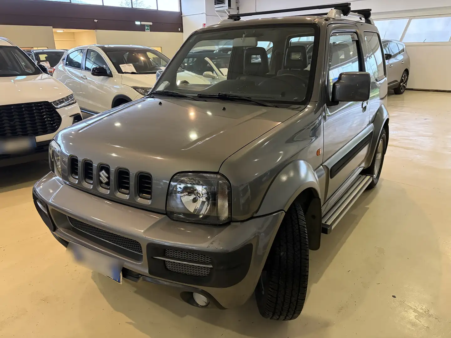 Suzuki Jimny 4x4 Comfort Gris - 1