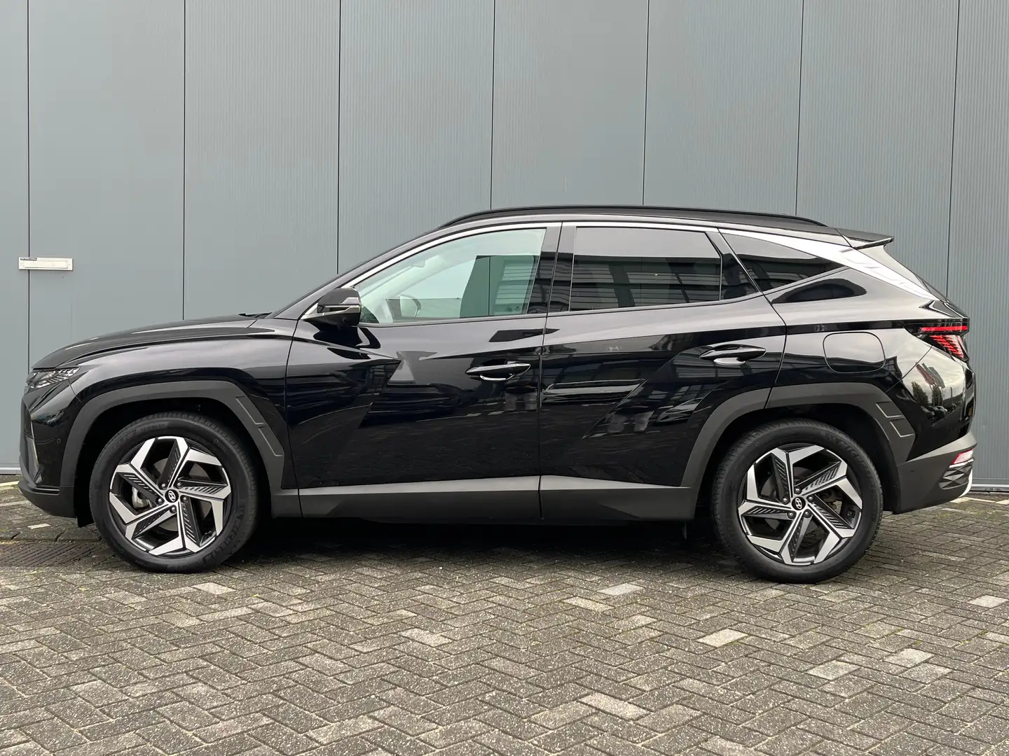 Hyundai TUCSON 1.6 T-GDI 265pk PHEV Premium 4WD (299,- p/m Demo D Noir - 2