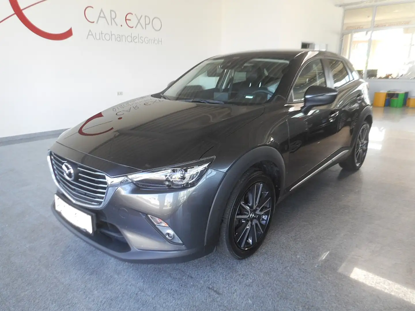 Mazda CX-3 G120 Revolution Grau - 1