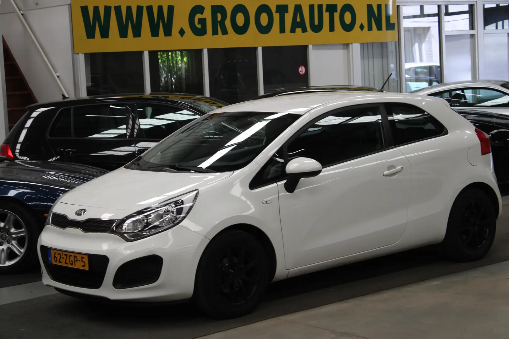 Kia Rio 1.2 CVVT Comfort Pack NAP, Airco, Apple Carplay, T Grijs - 1