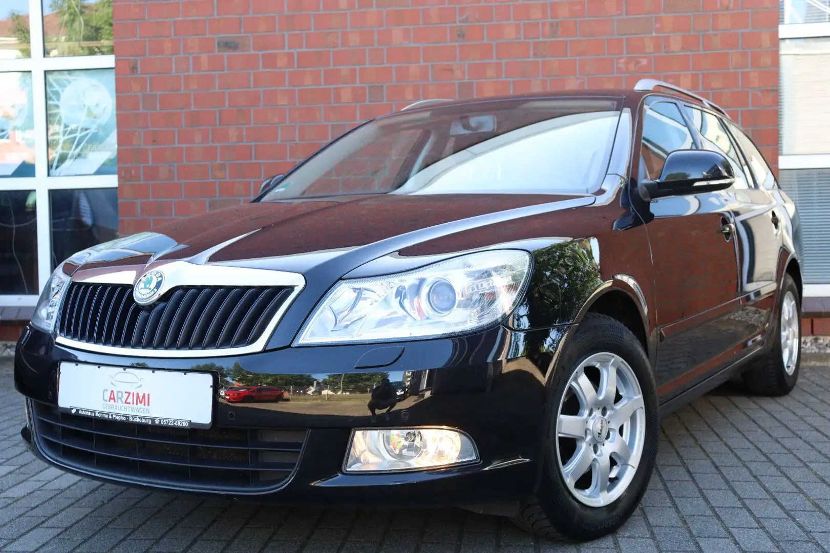 Skoda Octavia 1.4 TSI Combi Elegance Klimaauto. PDC Schwarz - 1