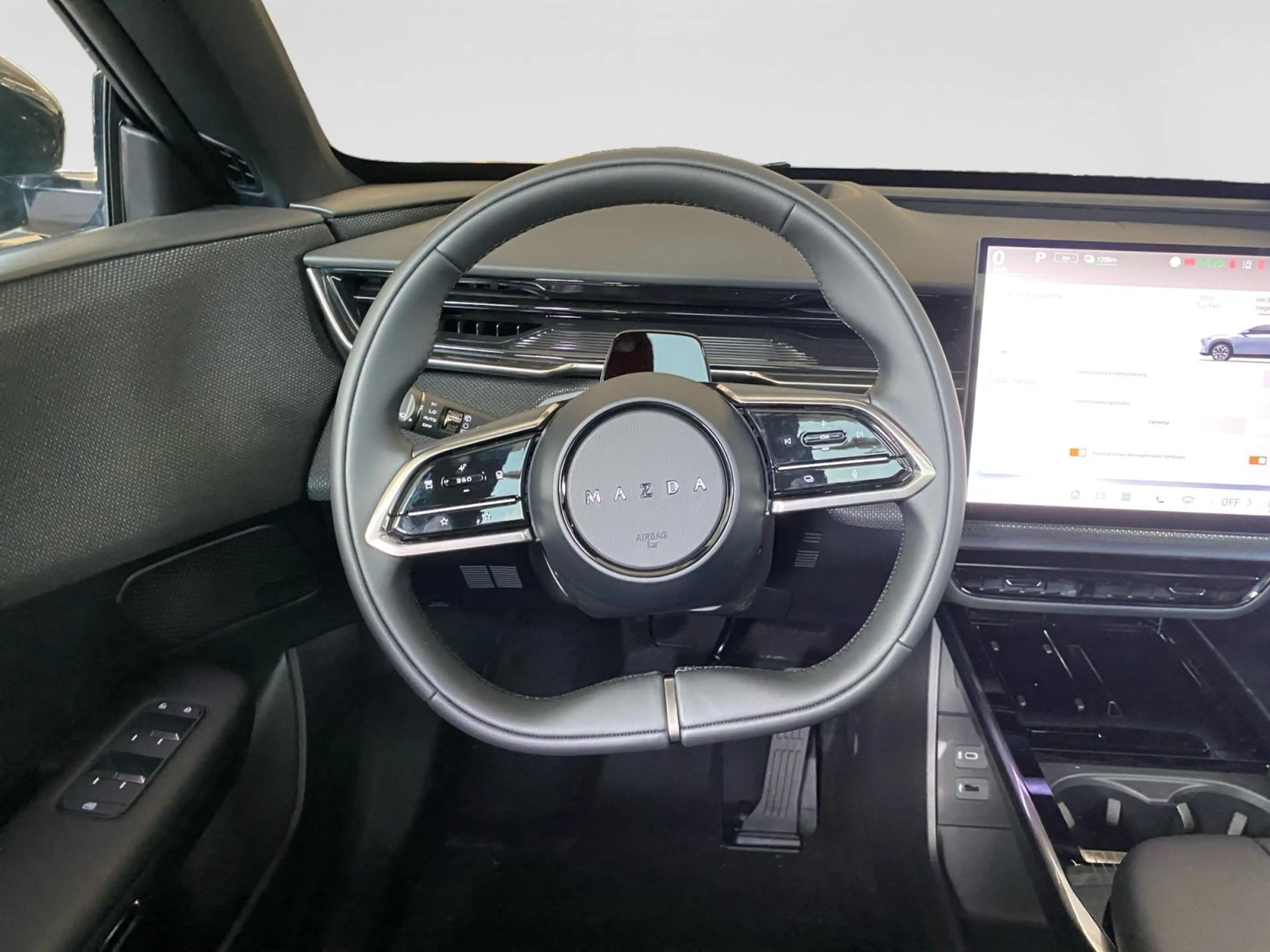 Mazda 6e CX-6e EV Takumi — photo 14