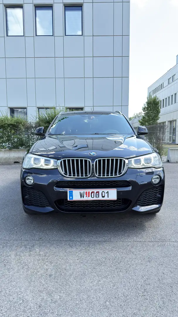 BMW X4 xDrive 30 d Schwarz - 1