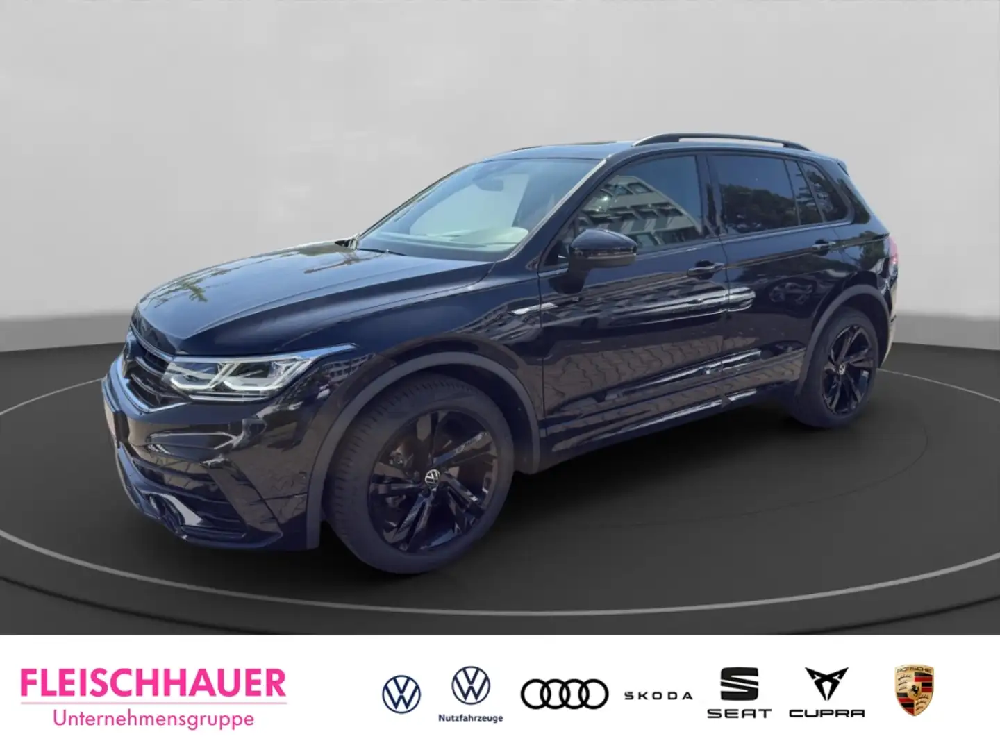 Volkswagen Tiguan 2.0 l TDI 4Motion R-Line PANO NAVI AHK KEYLESS Schwarz - 1