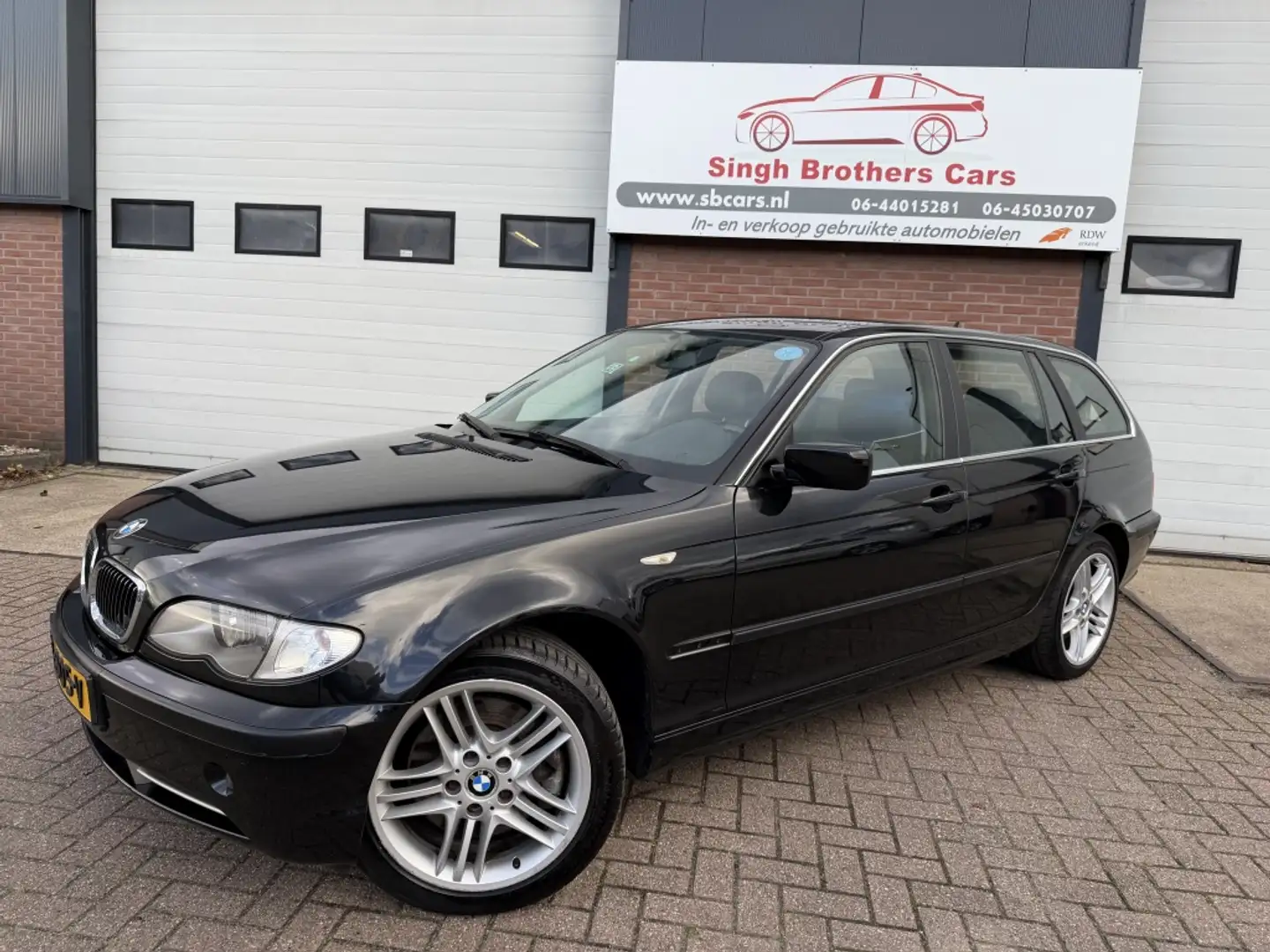 BMW 330 3-serie Touring 330xi 4X4 AUT LEER Y-TIMER INRUIL Zwart - 2