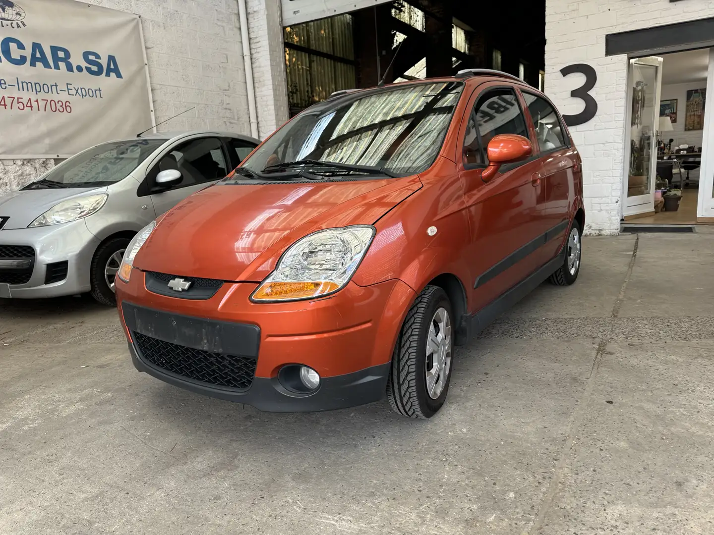 Chevrolet Matiz 1.0i SX *CT* *Carpass* *Prêt à immatriculer* Orange - 1