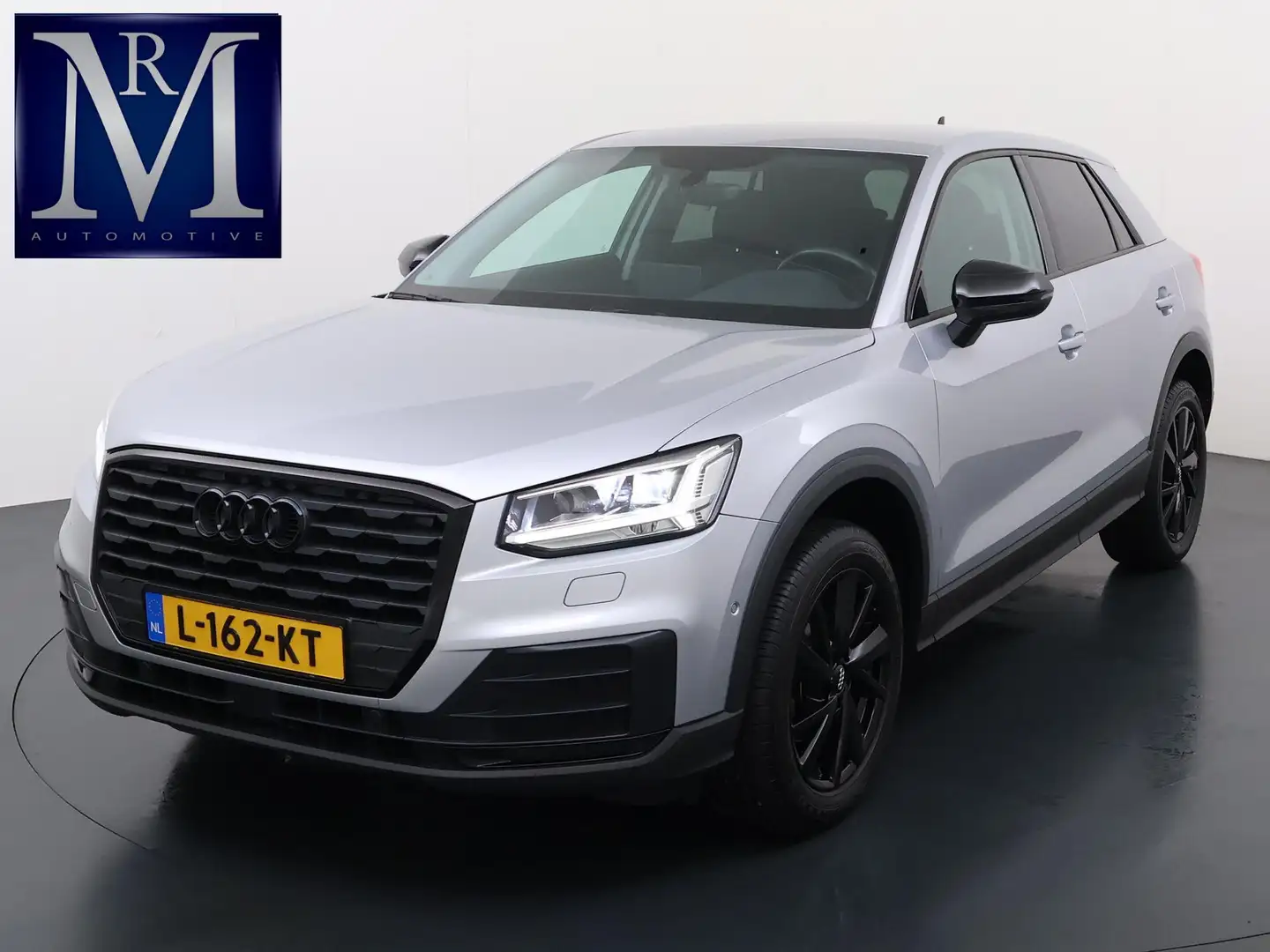 Audi Q2 35 TFSI S Edition VAN: €26.900,-  VOOR: €23.877,- Grijs - 1