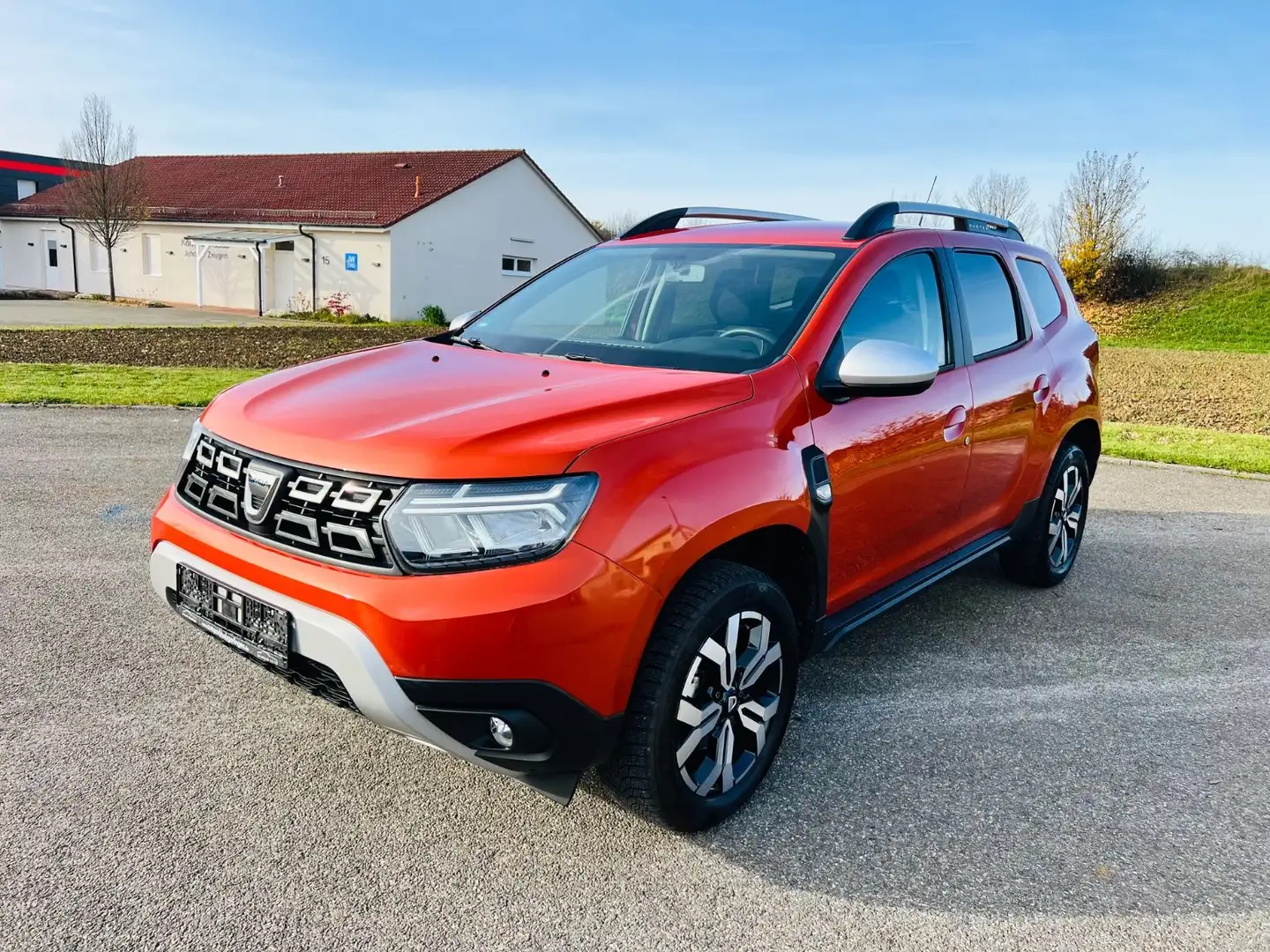 Dacia Duster II Prestige*AUTOM*NAVI*KAMERA*SITZHZG* Orange - 1
