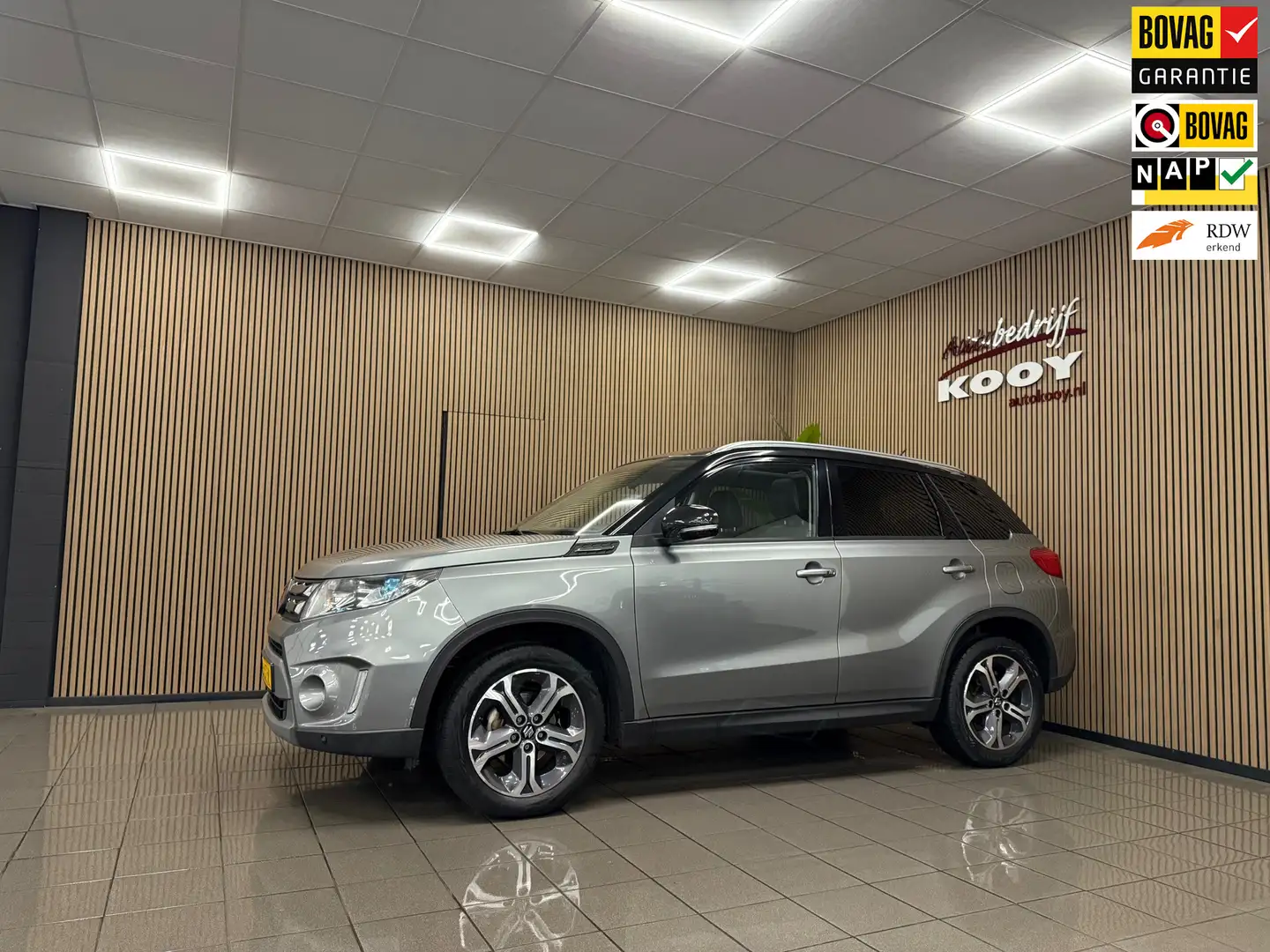 Suzuki Vitara 1.6 High Executive * Panoramadak / Navigatie / Afn Gris - 1