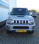 Suzuki Jimny 1.3 EXCLUSIVE 4WD,Leer,Stoelverw,1e Eignr,Trhaak Gris - thumbnail 3