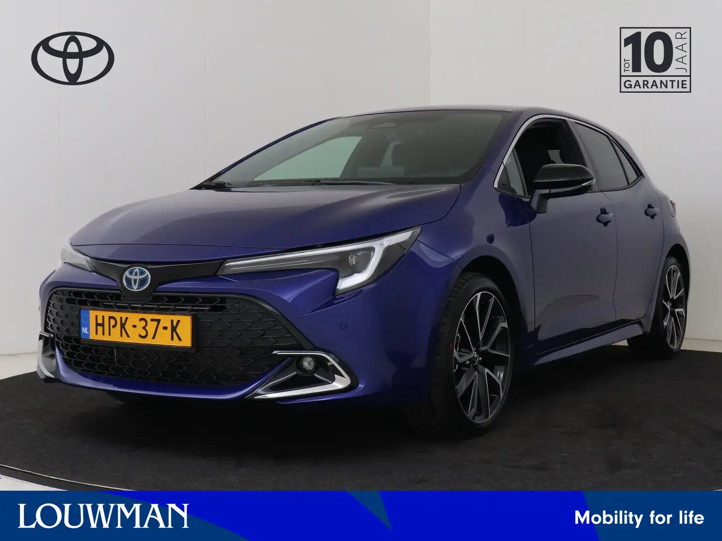 Toyota Corolla Hybrid 180 Executive Blauw - 1