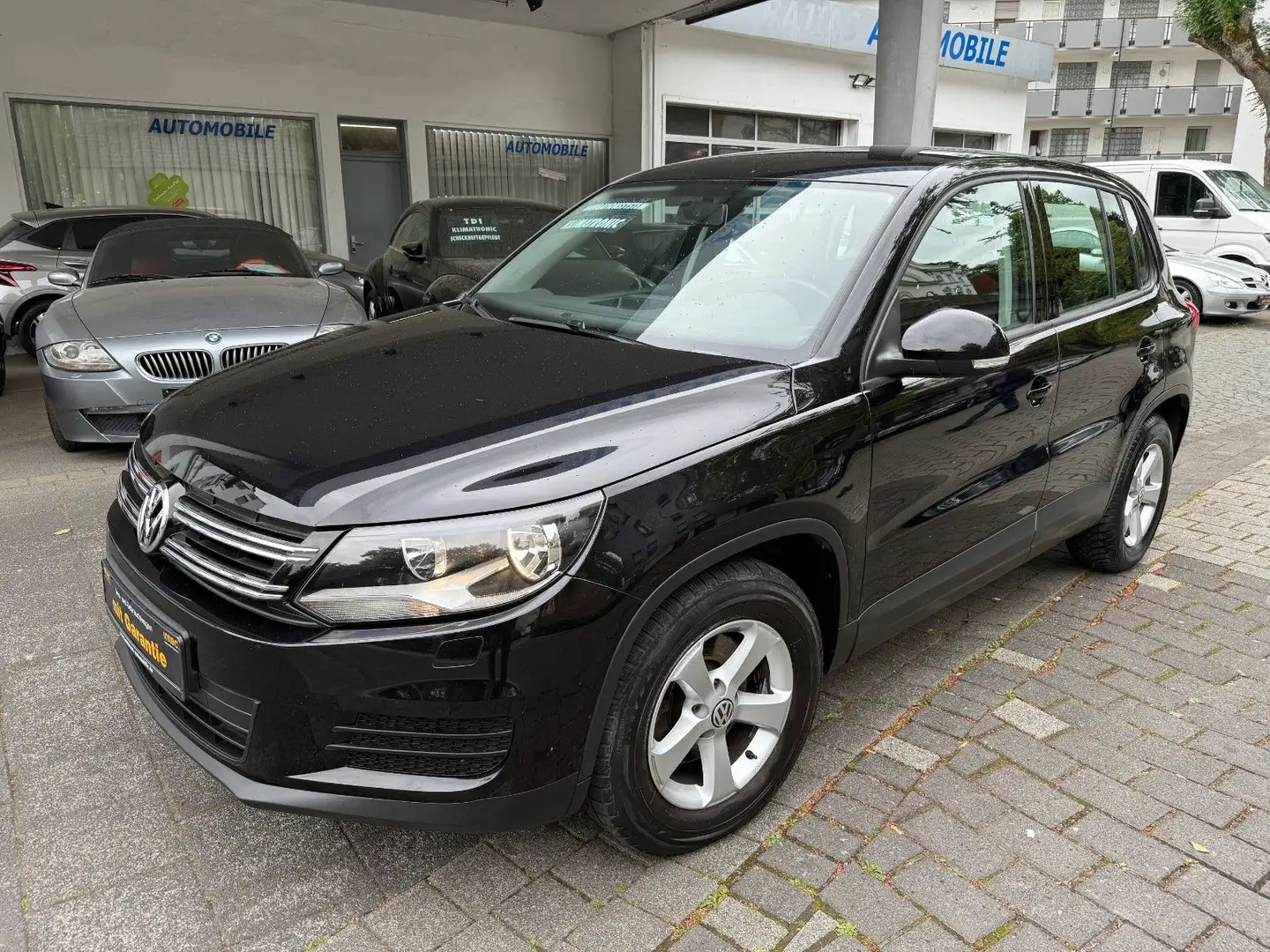 Volkswagen Tiguan 1.4 tsi,Klimaau.,Navi,PDC,1 Jahr Garantie Schwarz - 1