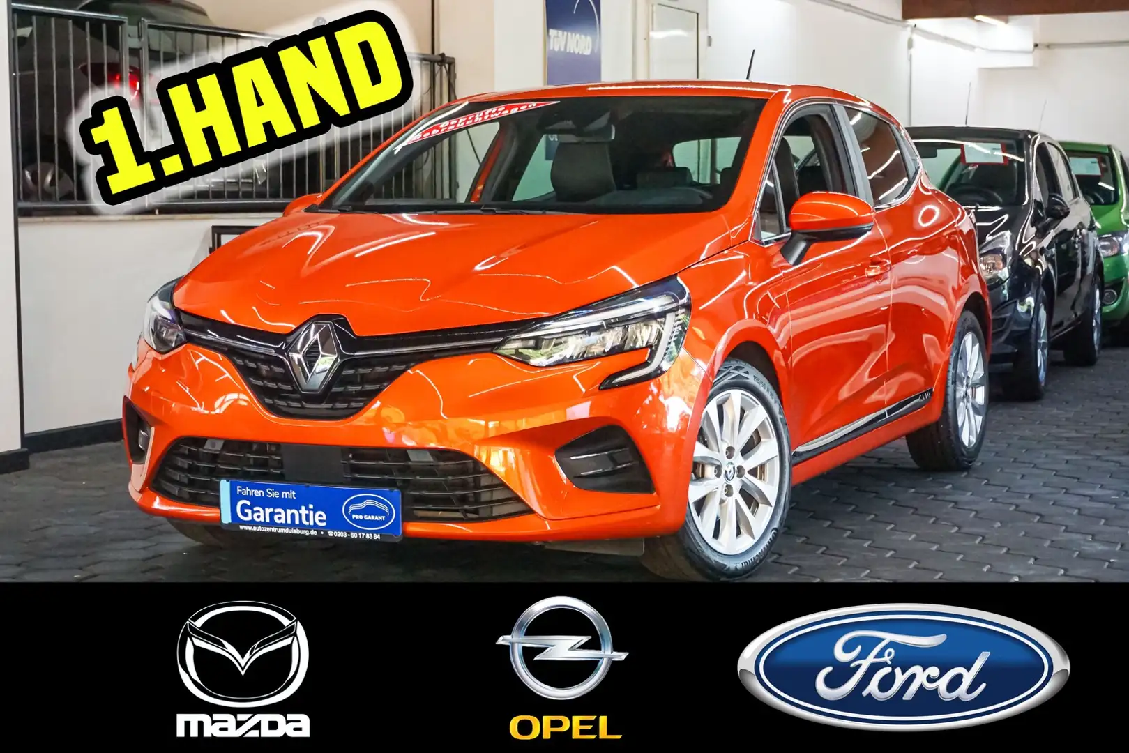 Renault Clio V 1.6 E-Tec Hybrid 140 Intens 1.Hand LED Orange - 1