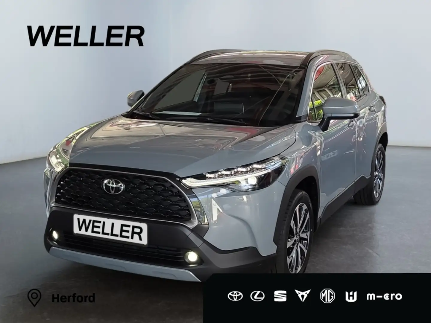 Toyota Corolla Cross Hybrid 1.8 Teamplayer *LED*ACC*CAM* Grijs - 1
