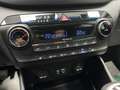 Hyundai TUCSON 1.7 CRDi  ISG * 1ER PROP + GPS + CAMERA * CLIM * Gris - thumbnail 15