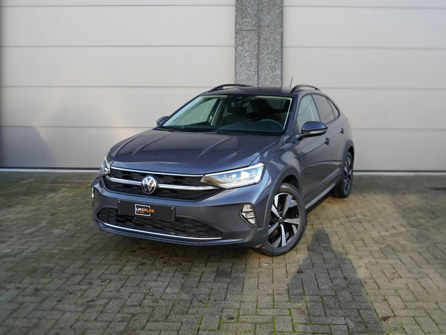 Volkswagen Taigo NEW *CAMERA / MATRIX / ZETELVERWARMING / KEYLESS* Gris - 1