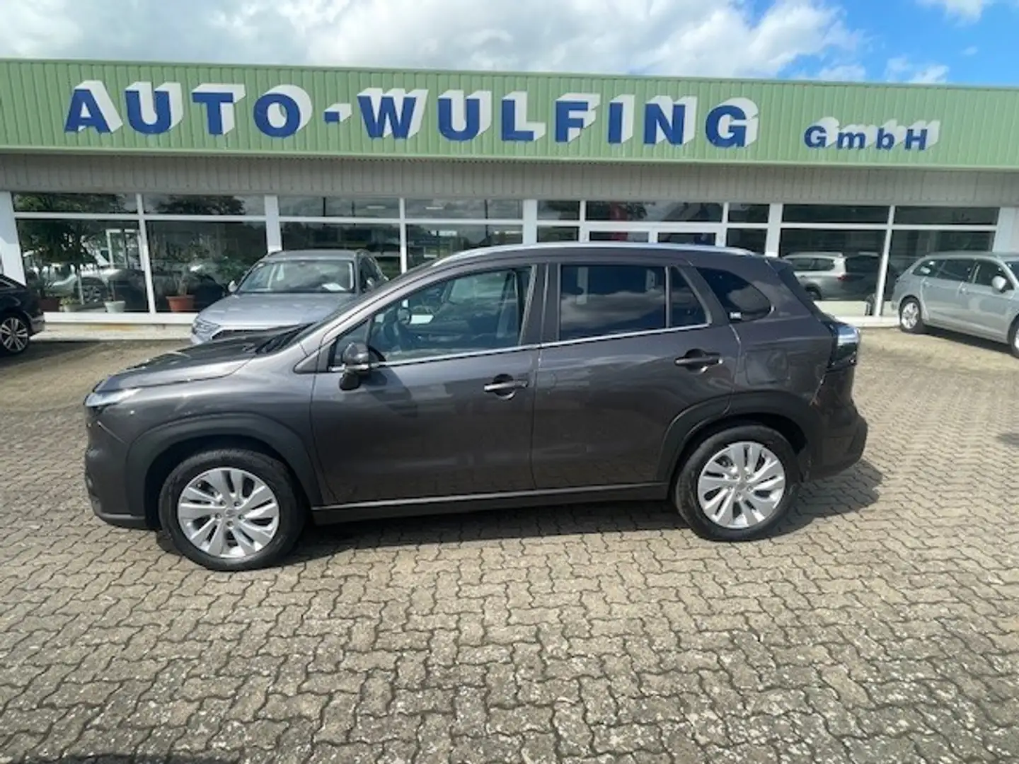 Suzuki 1.5 Dualjet Hybrid 4x4 Comfort Autom ACC Kamera 7t Grau - 1