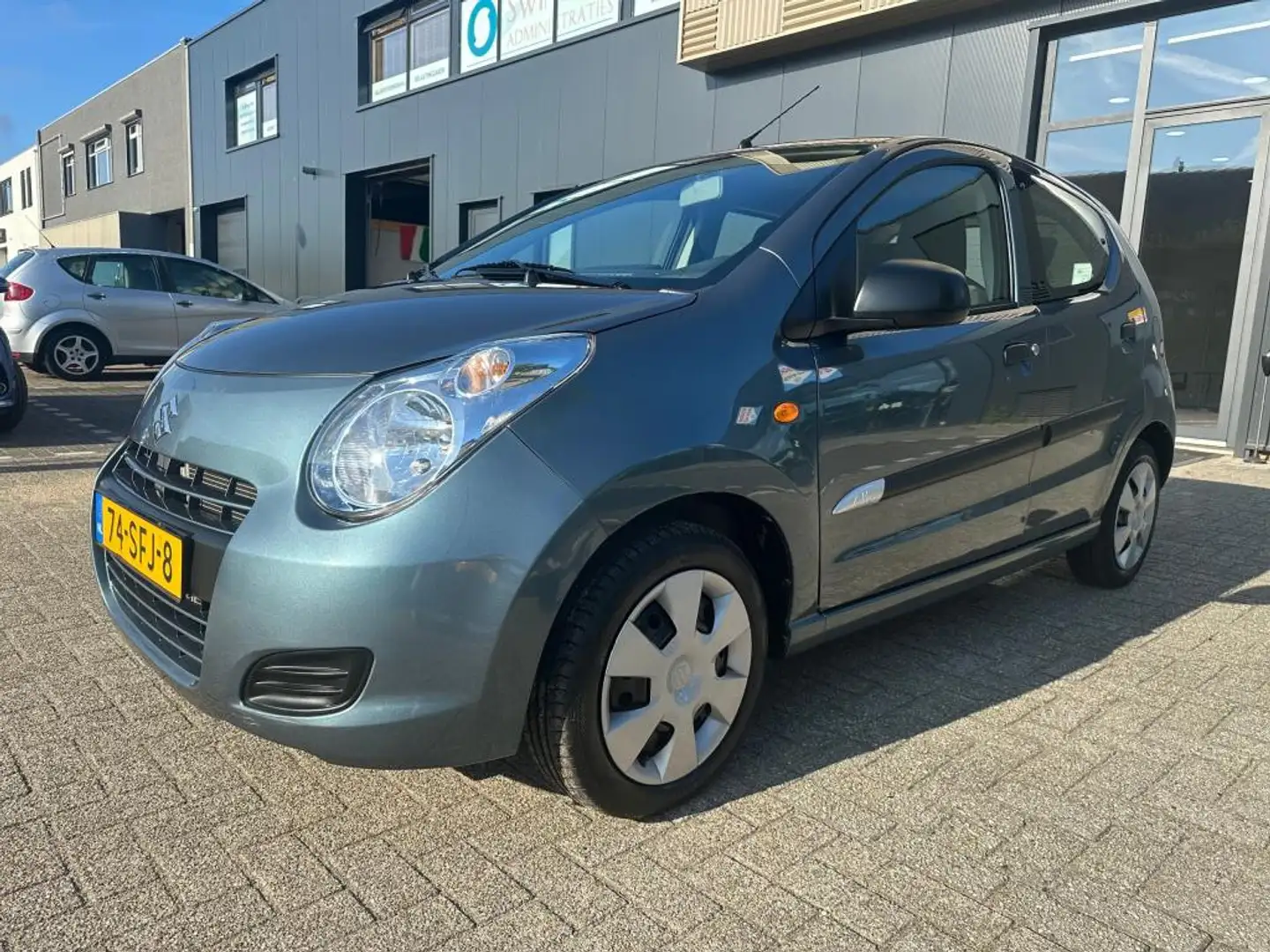 Suzuki Alto 1.0 Comfort Plus, Airco, Elektr ramen, 1e eigenaar Gris - 1
