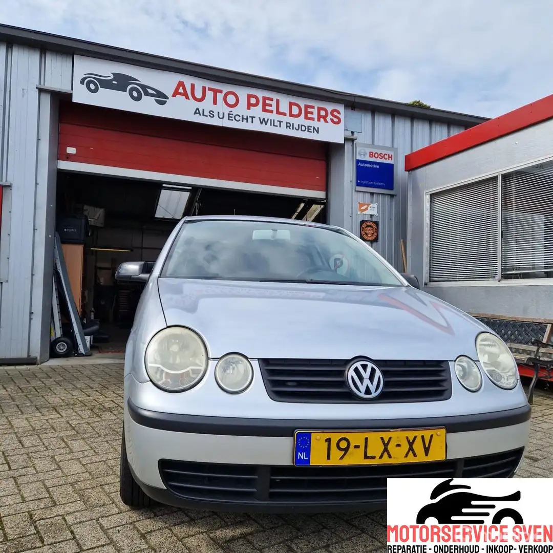 Volkswagen Polo 1.2-12V Grijs - 1