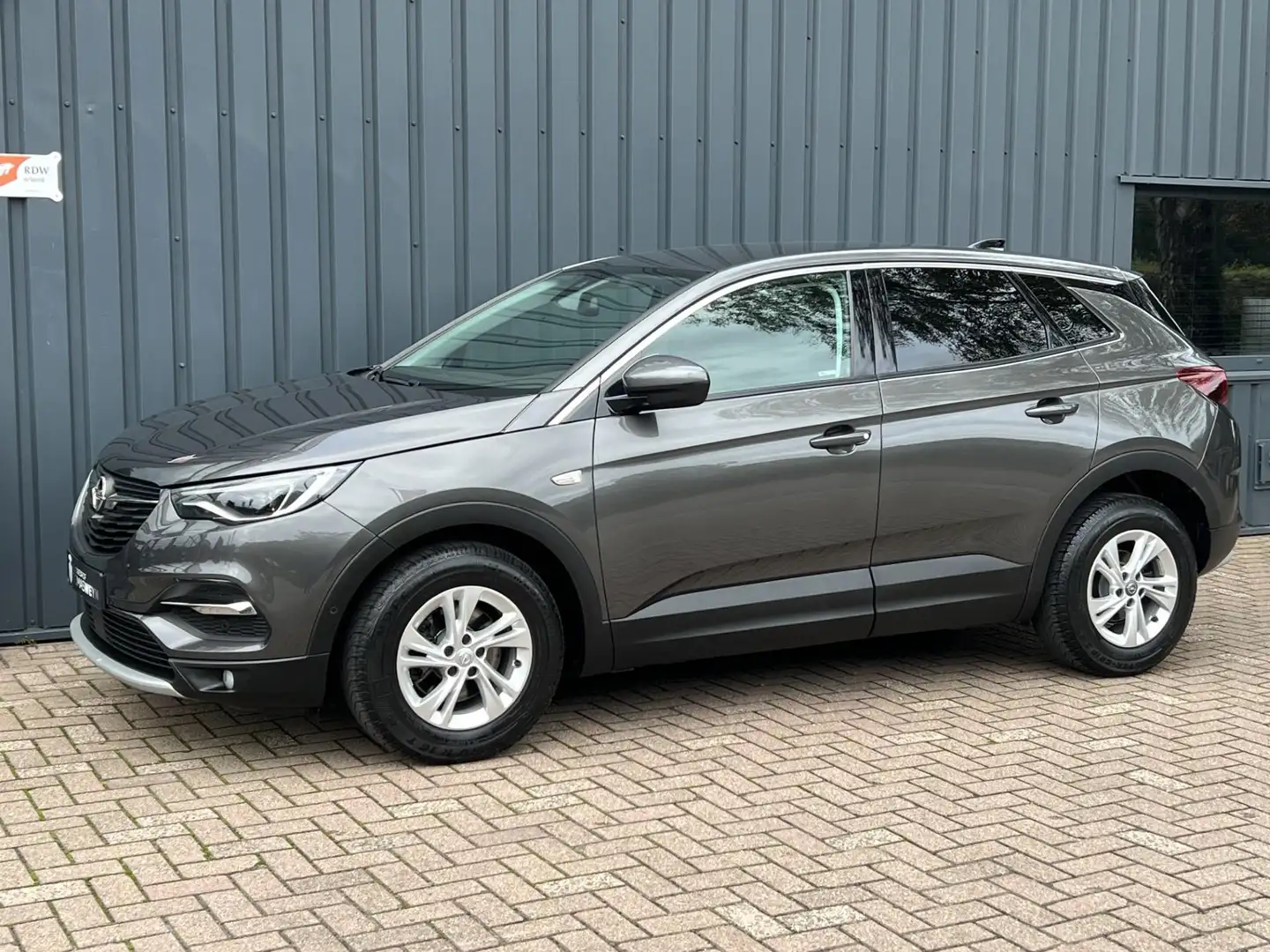 Opel Grandland X 1.2 Turbo Business Executive 1E EIG.!/APK!/ Grijs - 1