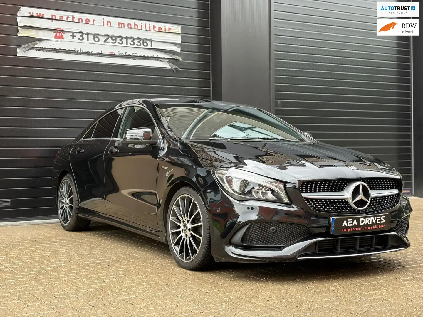 Mercedes-Benz CLA 220 d Ambition | AMG styling | Navi | Leder | Dealeron Zwart - 1