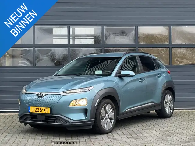 Hyundai KONA EV FASHION 64 KWH I 3 FASE I 100% SOH I P-CAMERA I