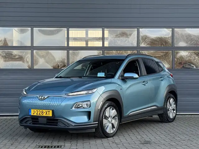 Hyundai KONA EV FASHION 64 KWH I 3 FASE I 100% SOH I P-CAMERA I