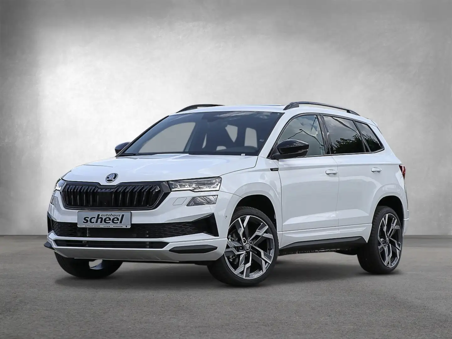 Skoda Karoq 1.5 TSI ACT Sportline 360 Pano SpurH AHK Wit - 2