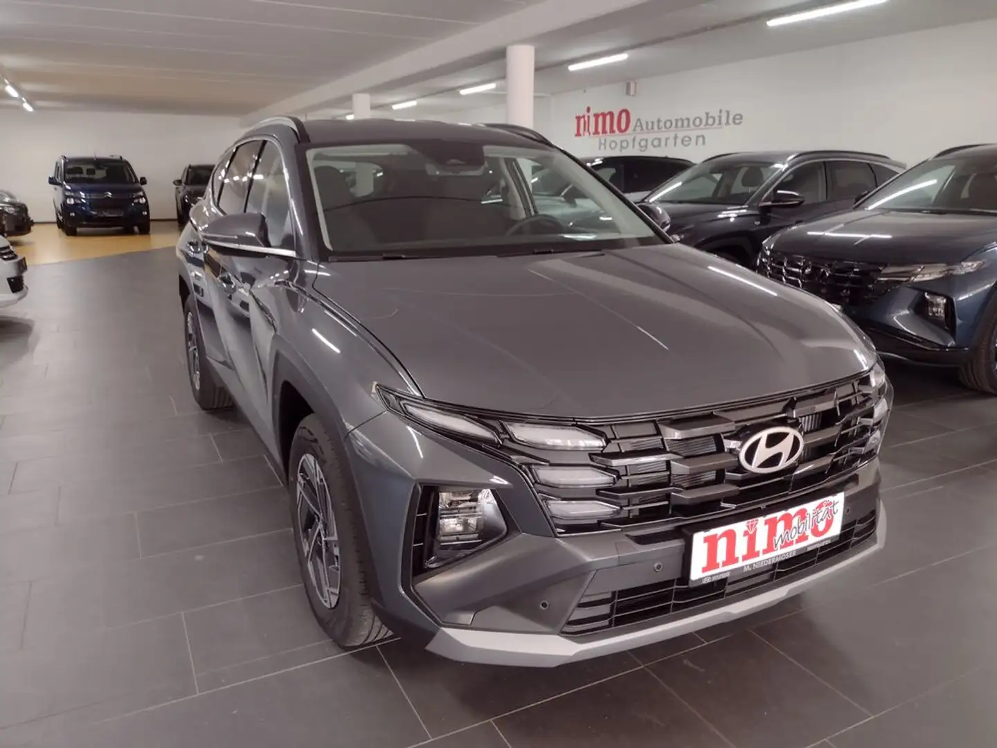 Hyundai TUCSON NX4 Jubile 1,6 T-GDi 2WD 48V Gris - 1