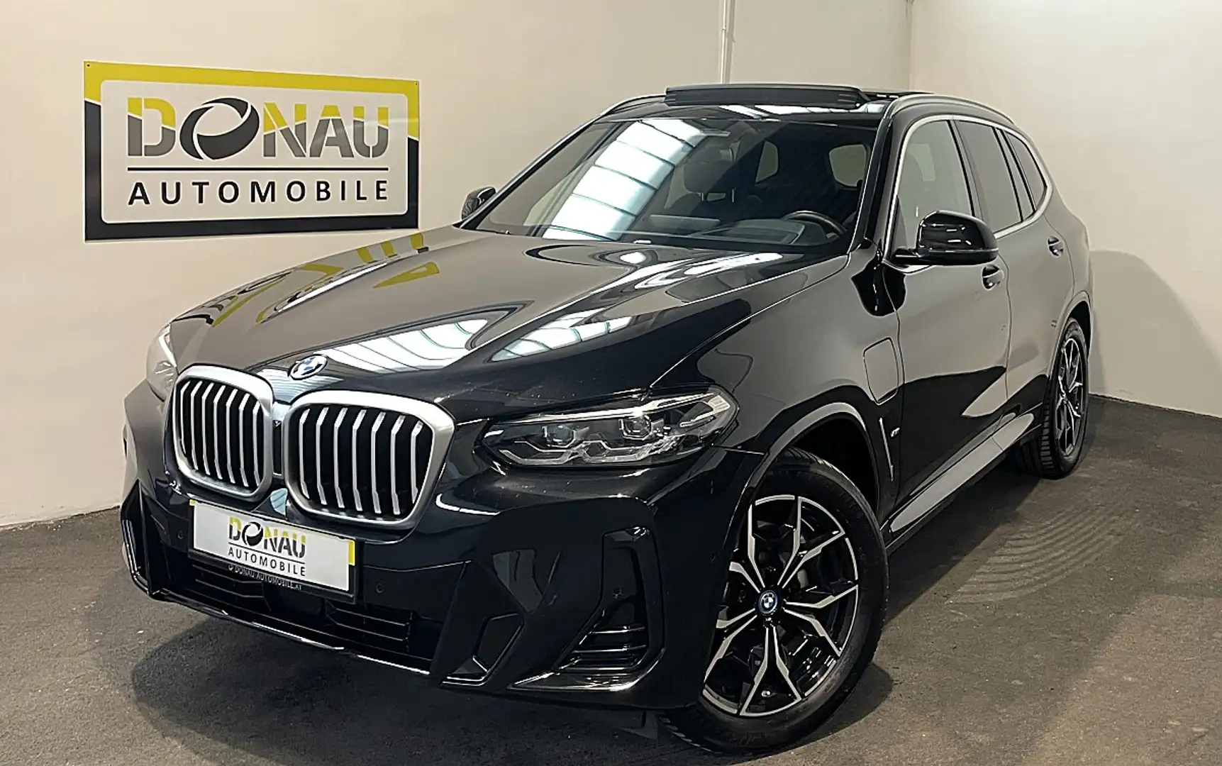 BMW X3 xDrive30e PHEV Aut. * AHK * ACC * Pano * Leder * Schwarz - 1