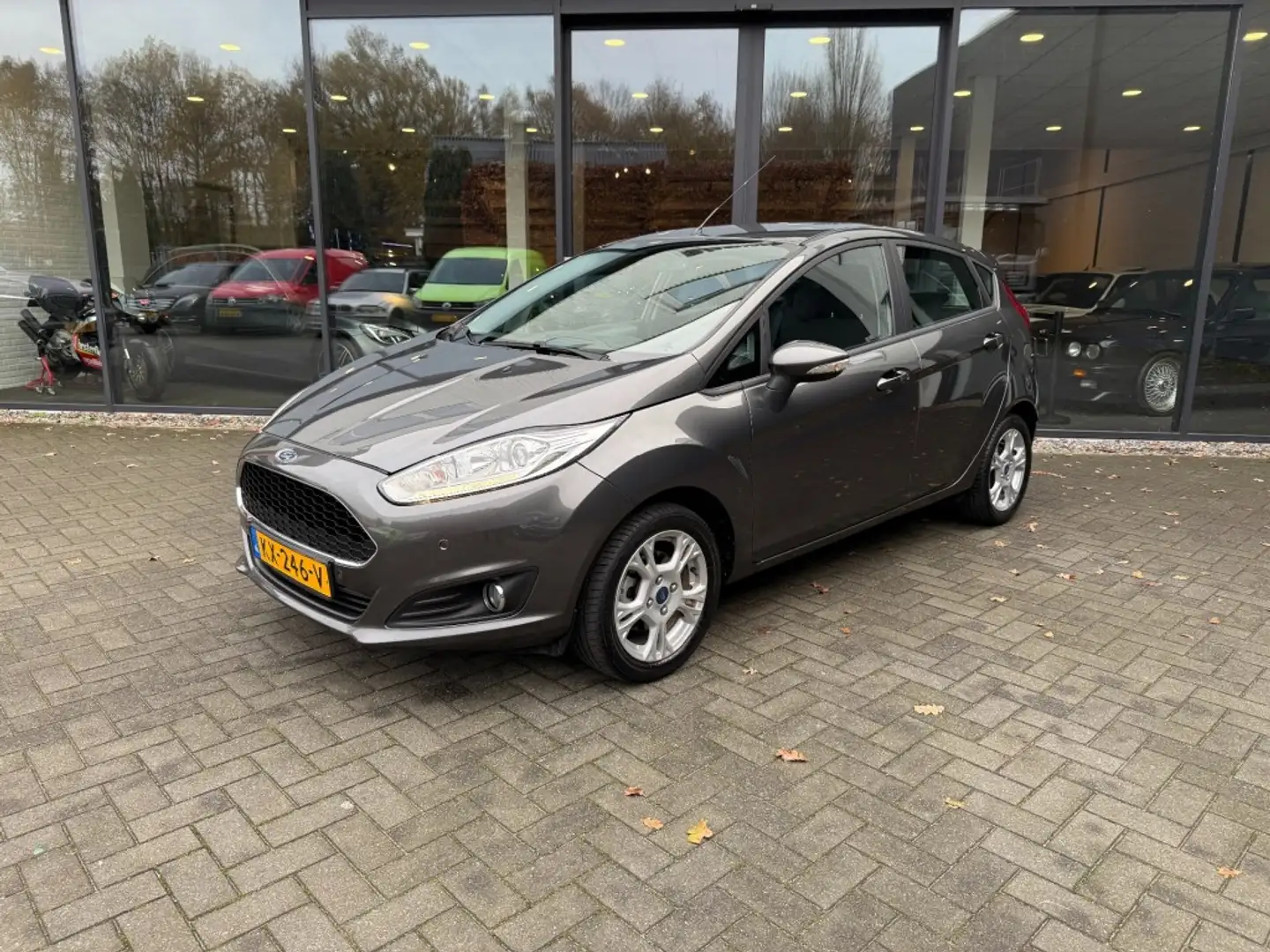 Ford Fiesta 1.0 80pk Style Ultimate,Cruise,Airco,Navi,PDC V+A, Grigio - 1