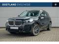 BMW X1 sDrive18i M Sport Automaat / Sportstoelen / Achter Noir - thumbnail 1
