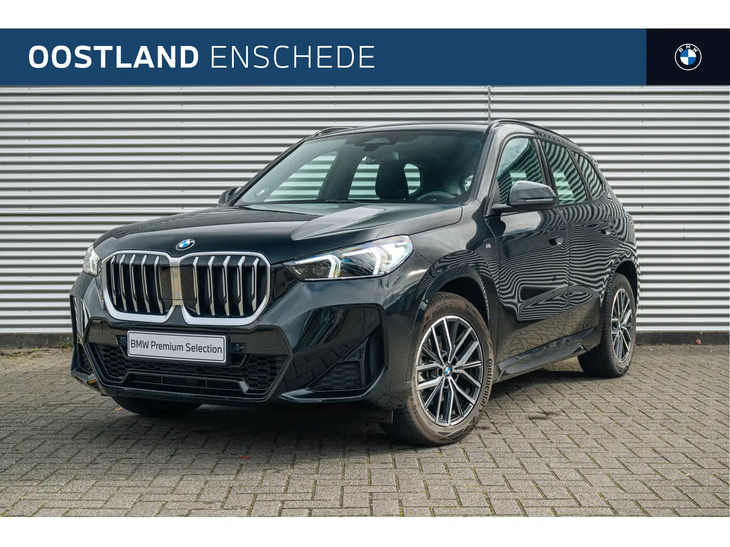 BMW X1 sDrive18i M Sport Automaat / Sportstoelen / Achter Noir - 1