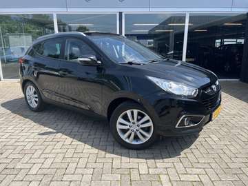 2.0i i-Catcher Leer / Schuif-kantel dak / Trekhaak