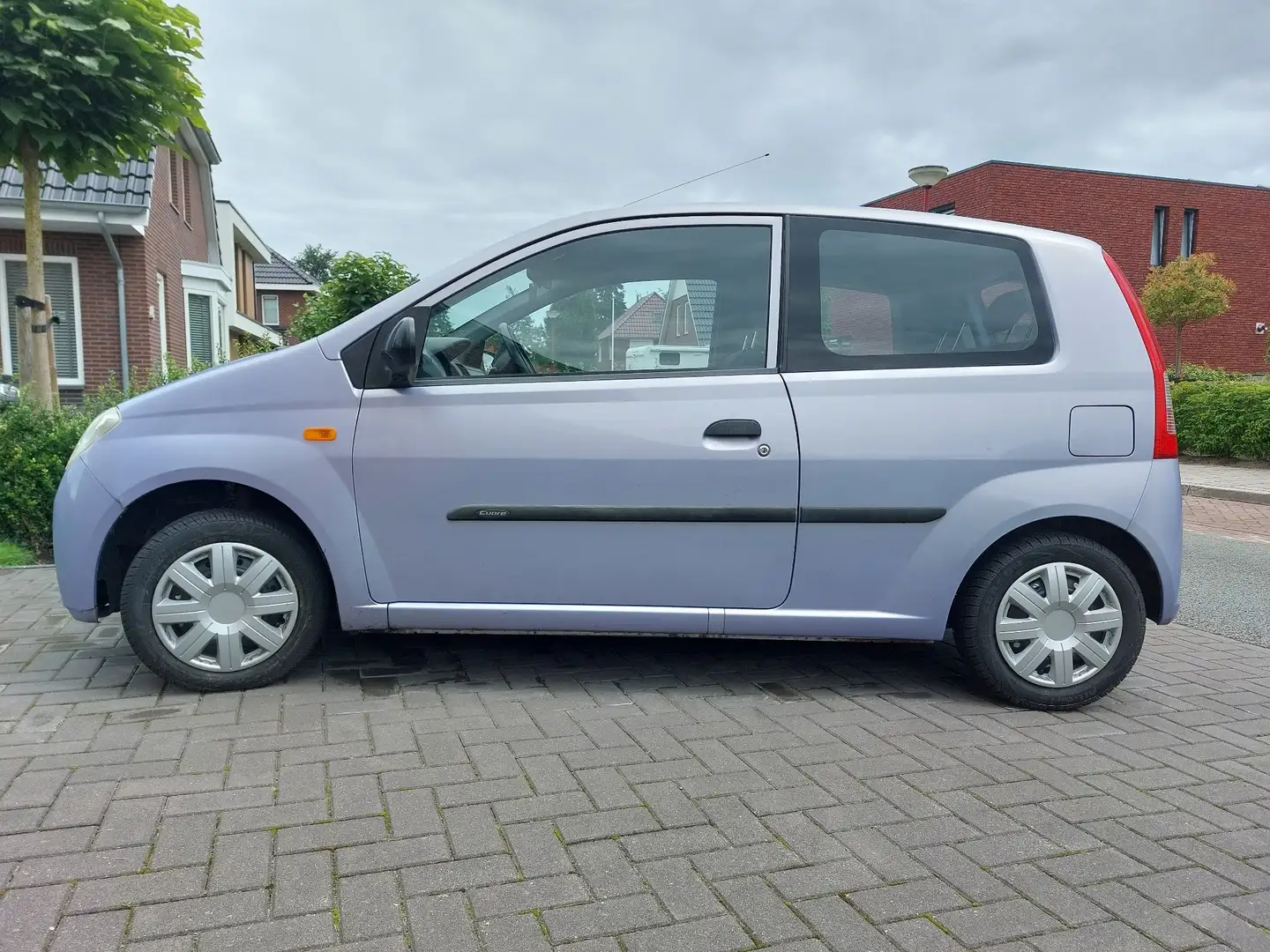 Daihatsu Cuore 1.0-12V Tokyo Burdeos - 1