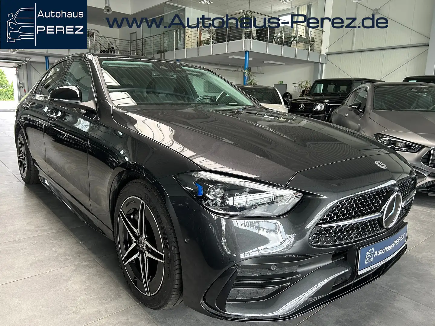Mercedes-Benz C 300 e AMG PREMIUM DISTRONIC-PANO-AHK-NIGHT Grijs - 1