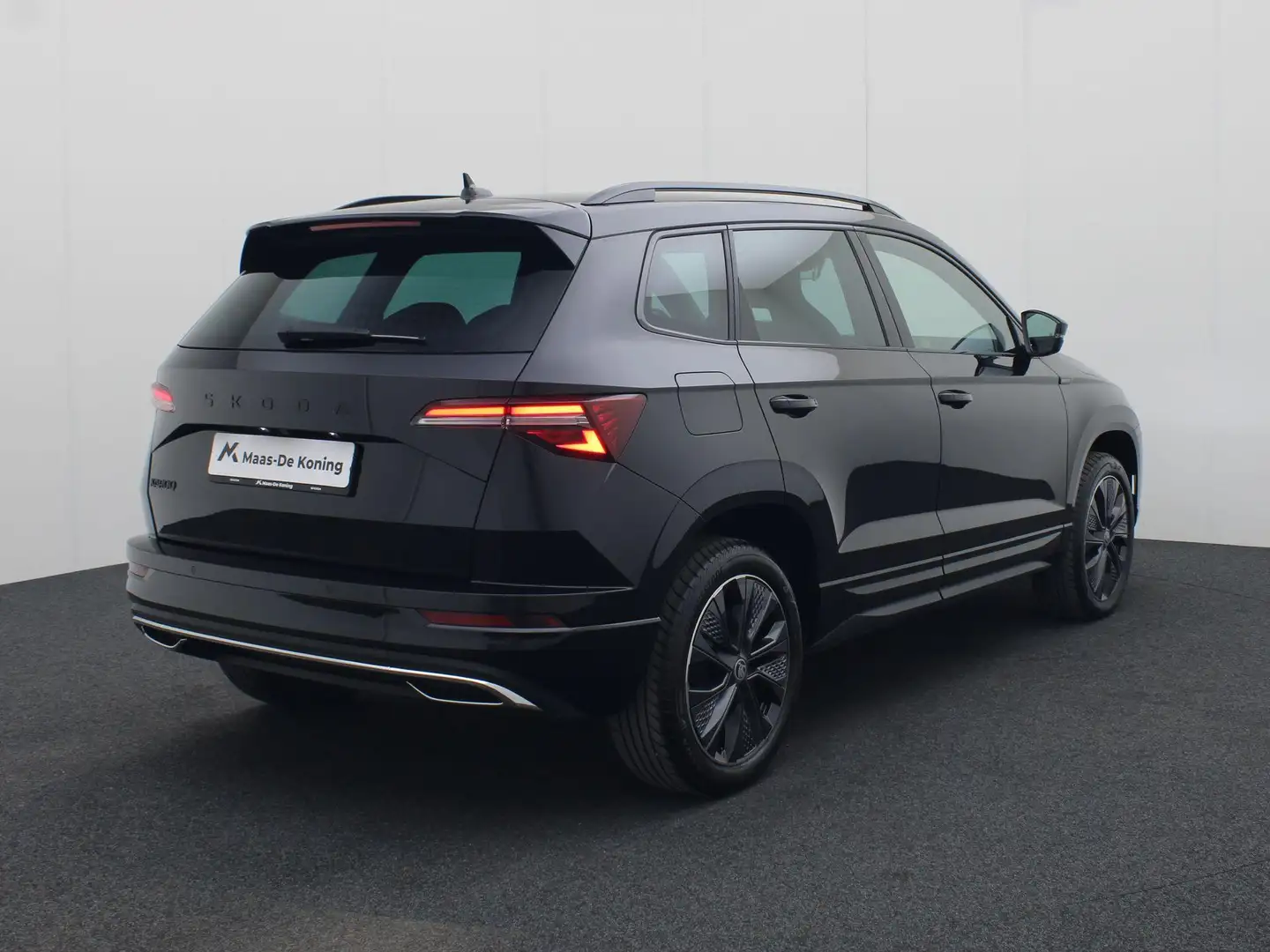 Skoda Karoq 1.5TSI/150PK ACT Sportline DSG · Navigatie · Trekh Zwart - 2