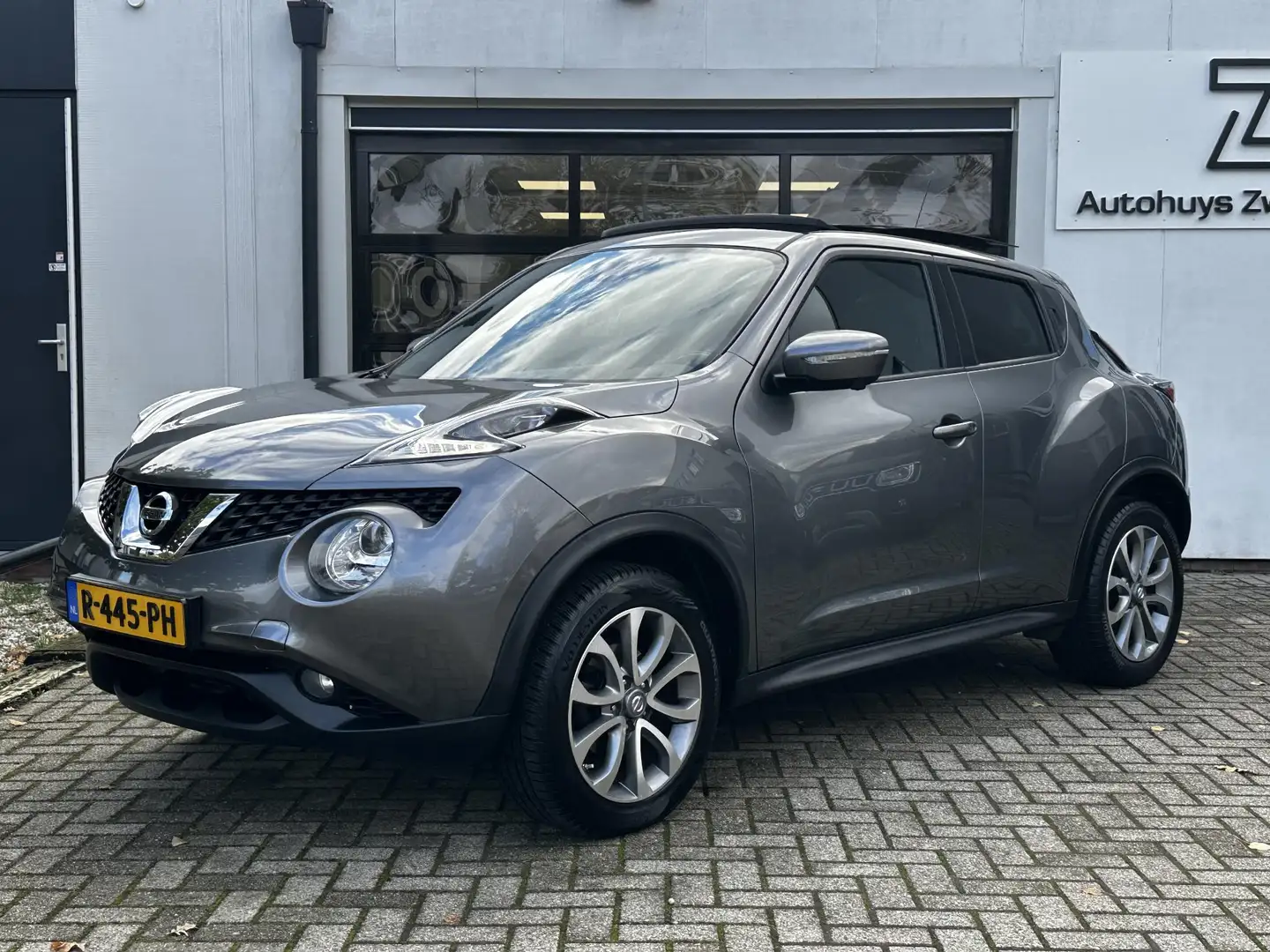 Nissan Juke 1.2 DIG-T S/S Tekna Vol opties 🌟 | Super nette aut Grijs - 1