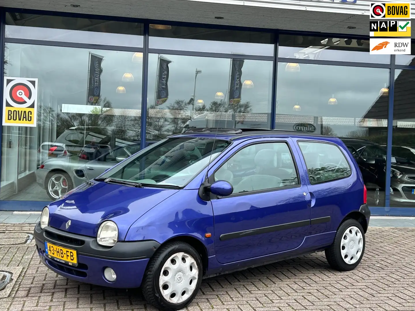 Renault Twingo 1.2 Privilège Elek. Panorama/Schuifdak Elek.Pakket Blauw - 1