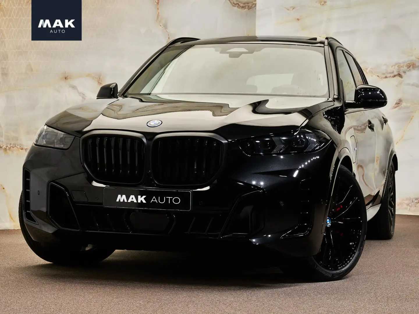 BMW X5 xDrive50e M Sport Pro, H/K, pano, 22", Merino, mem Zwart - 1