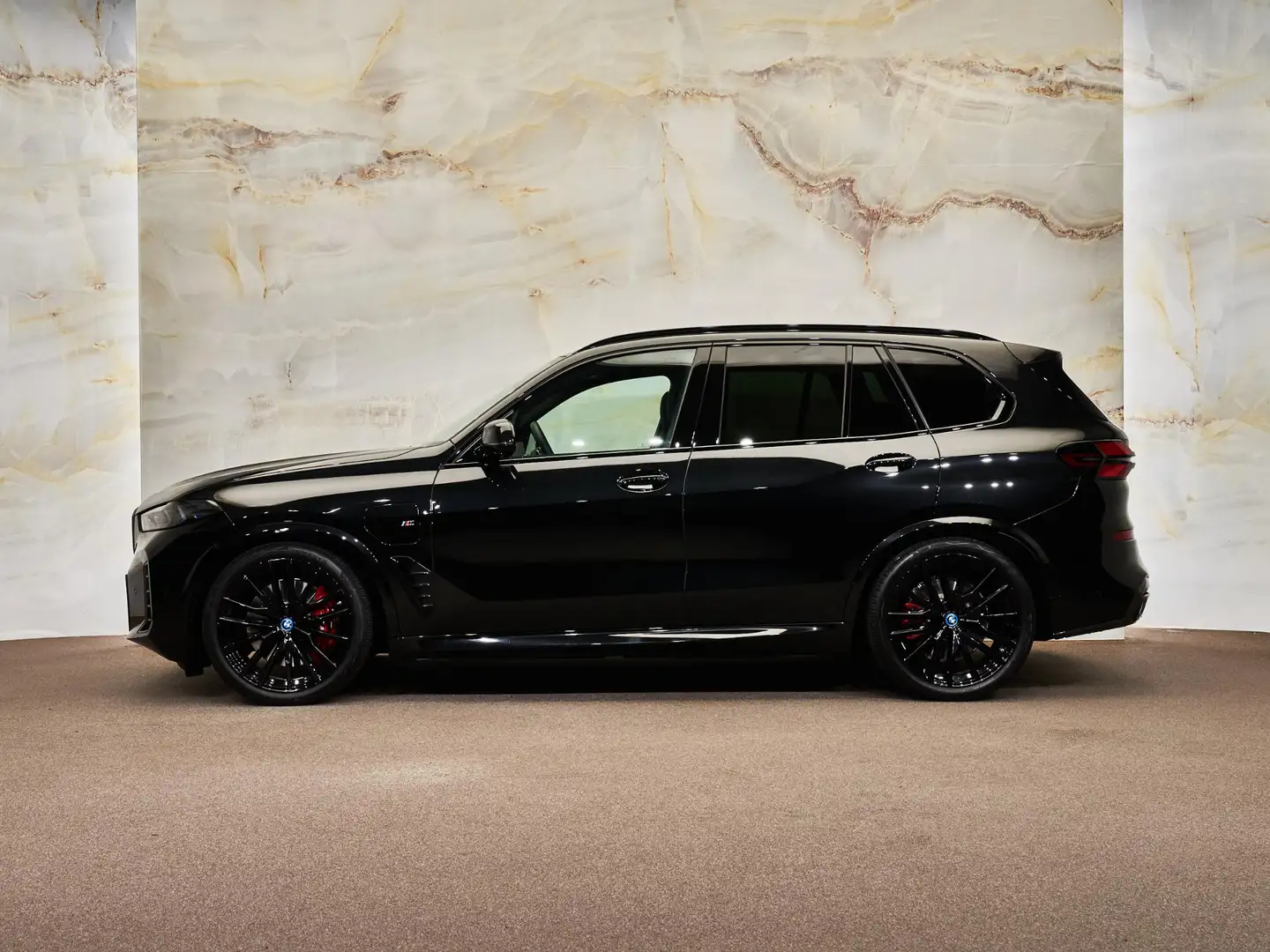 BMW X5 xDrive50e M Sport Pro, H/K, pano, 22", Merino, mem Zwart - 2