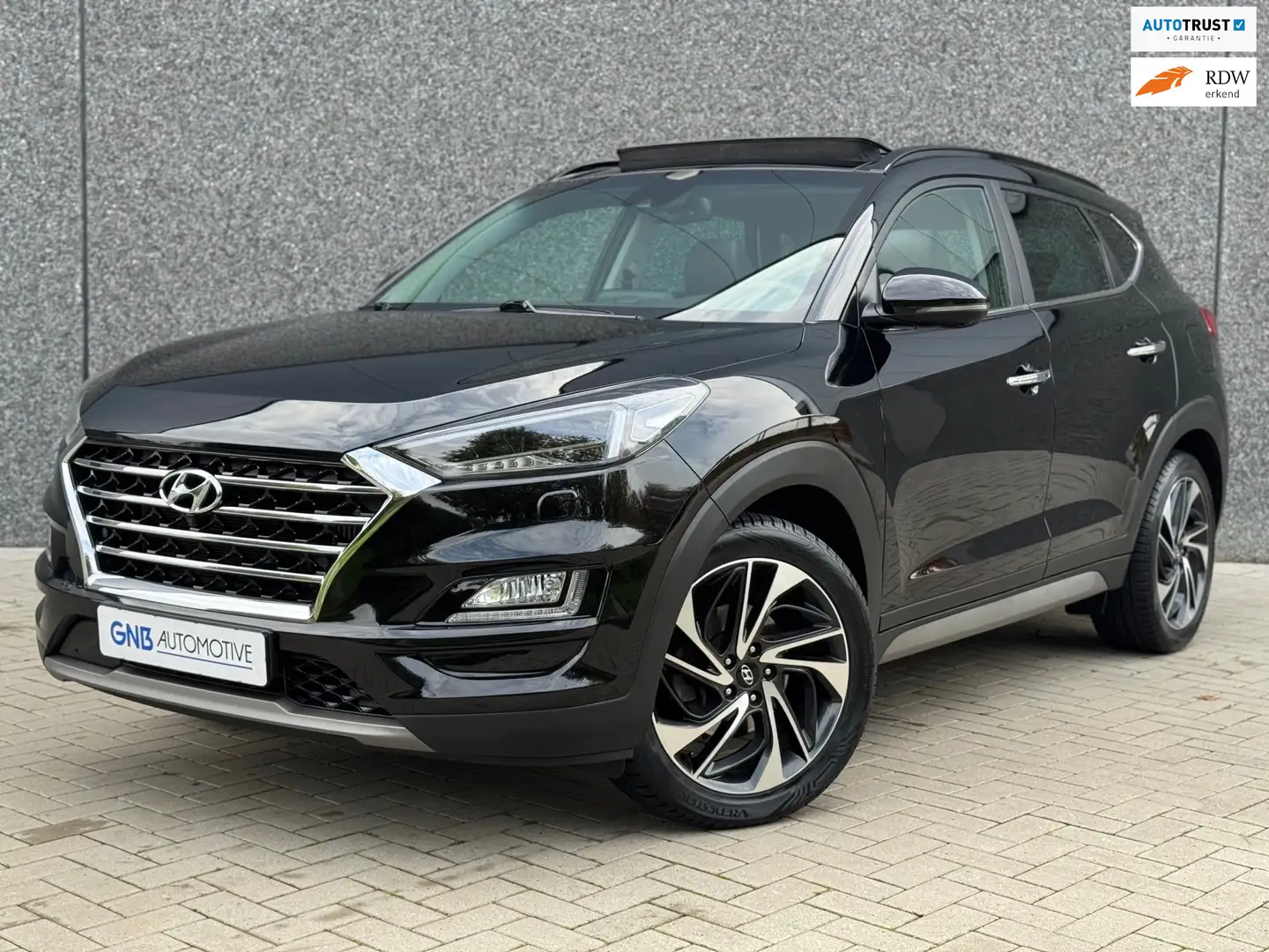 Hyundai TUCSON 1.6 T-GDI Premium | Panoramadak | Dodehoekassisten Zwart - 1