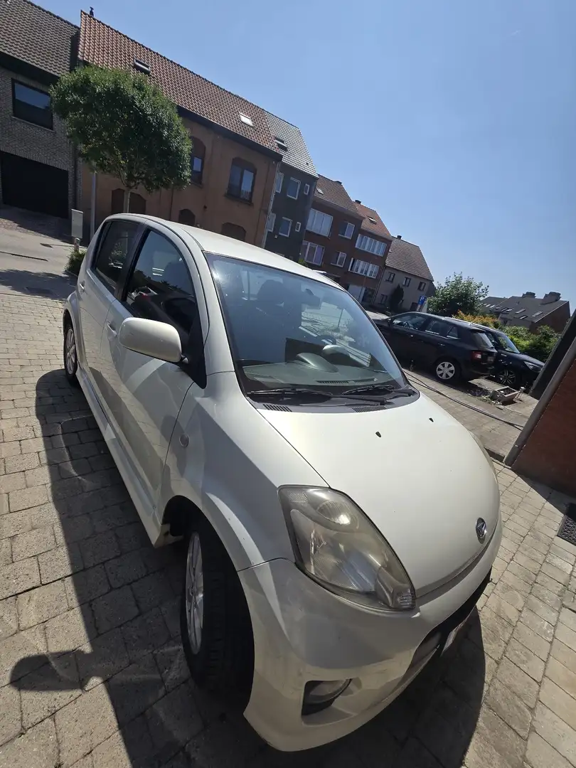 Daihatsu Sirion 1.5i Top S - 1